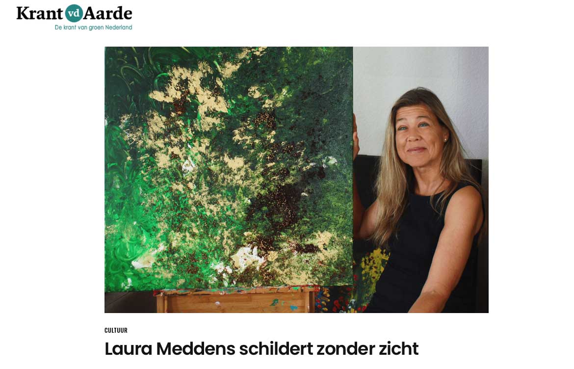 Cover page to profile of Laura Meddens in the Dutch language Newspaper Krant van der Aarde - Newspaper of the Earth. Laura sits beside one of her paintings.